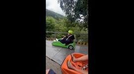 Tourist whizz down Mario Kart racetrack in go karts in Vietnam