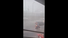 Storm lashes roads causing flash floods in Manila