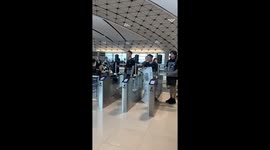 Passenger walks onto plane with giant boarding pass printed at home