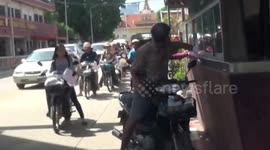 Cambodians begin panic-buying fuel as imports from Thailand are blocked over border dispute