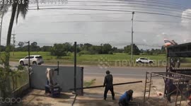 Out-of-control car narrowly misses builders working on home