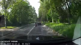Woman motorcyclist slams into lorry as it suddenly swerves left when she starts overtaking