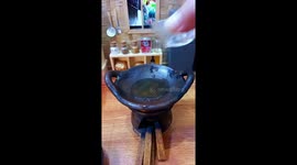 Cooking spicy eggs in the 'world's smallest kitchen'