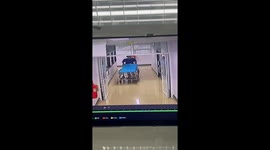 Wholesome moment hospital staff flirt from a distance in corridor