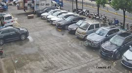 Scooter rider clotheslined by truck's tail lift in China