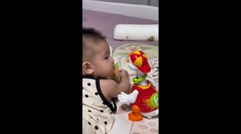 Baby pushes toy away after silly gesture in Shandong, China
