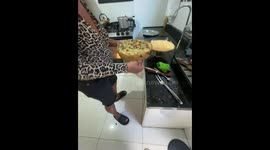 Baking mishap while transferring pie in Rio de Janeiro, Brazil