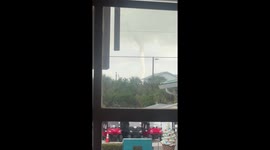 Waterspouts form offshore after storm in Anna Maria Island, Florida, USA