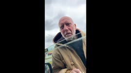 An old guy jokes about witches riding their brooms in Danville, Illinois, USA