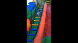 Child flips and falls inside inflatable slide in Minsk, Belarus