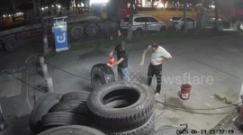 Tire explodes and nearly hits man in Guangdong, China
