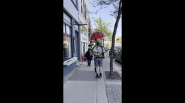 One Man Band Marches Through Petoskey, Michigan