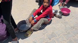 Charities distribute food in war-torn Gaza's Nuseirat Refugee Camp