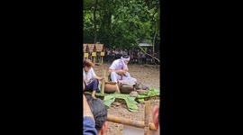 Shaman eats raw buffalo meat at ritual in northern Thailand