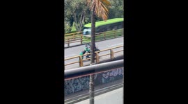 Biker Helps Man Climb Hill