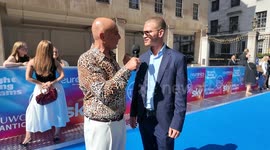 Love Island star Blu Chegini chats on the red carpet at the Tric Awards