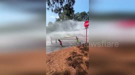 US: Fire Hydrant Turned Into Splash Zone As Southern Pines Kids Beat The Heat