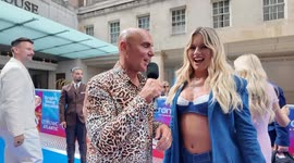 Love Island star Tasha Ghouri chats on the red carpet of the Tric Awards
