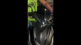Scooter rider finds stray kitten purring from inside the engine