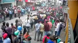 Devotees flee as elephant bolts during religious procession in India