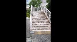 Flood sends water gushing down pedestrian stairs