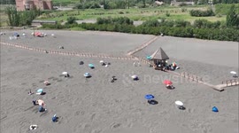 China: Sand therapy attracts tourists to NW China's Xinjiang