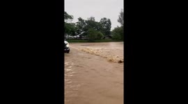 Heavy rain triggers flash floods submerging thousands of homes in Thailand