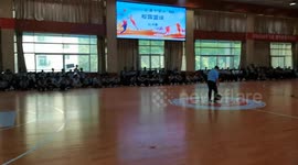 Principal makes no-look basketball shot in Shaanxi, China