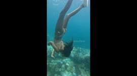 Snorkeller dragged by currents crashes into coral injuring her arm