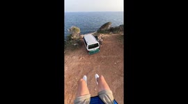 Paragliding dad shares sweet mid-air moment with baby in Majorca, Spain