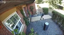 Funny moment schoolboy face-plants floor trying to take off backpack