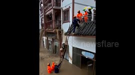 Terrifying moment mudslide crashes into apartment block in China