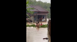 Village submerged in floodwater after heavy rainfall in Laos