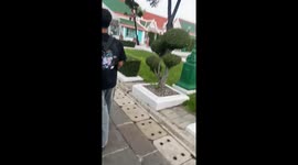 Tourist has terrifying trip to Thai landmark as storm tears down tents