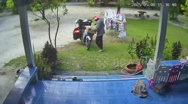 Wholesome deliveryman moves resident's clothes rack in from the rain