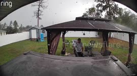 Storm Sends Neighbor's Tree Flying at Man