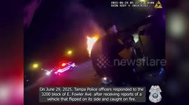 Tampa Officers Rescue Woman From Burning Vehicle After Crash