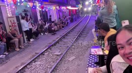 Tourist nearly killed when he stumbles into oncoming train at landmark in Vietnam
