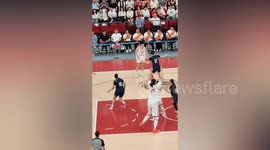 Chinese schoolgirl standing 7ft 5ins towers over her opponents in basketball match