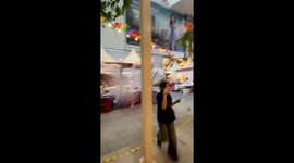 Heavy rain and strong wind batter shop in Bangkok
