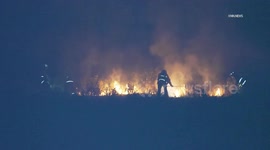 US, Los Angeles: Sylmar LAFD Responds to Grass Fire in Large Field
