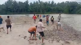Crocodile catches grandfather, 80, and floats away clutching him in jaws