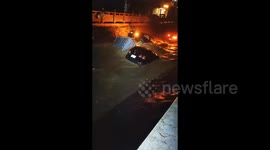Terrifying flash floods sweep cars into river as torrential rain batters central China