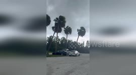 Gusts batter Picnic Island in Florida as storm approaches