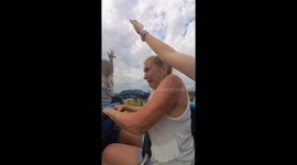 Woman records mom after tricking her into experiencing an intense water ride