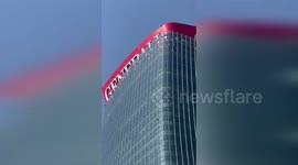 Italy: Huge Sign Collapses from Milan Skyscraper in Heatwave