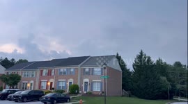 Thunderstorm clouds build and block lightning in Hunt Valley, Maryland, USA
