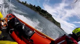 RNLI crew rescue day trippers from capsized dinghy in Cornwall