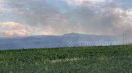 US: Firefighting Planes Unleash Red Cloud Over Garden Creek Blaze