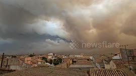Spain: Smoke From Giant Fire Covers Urgel As Flames Rip Through Fields